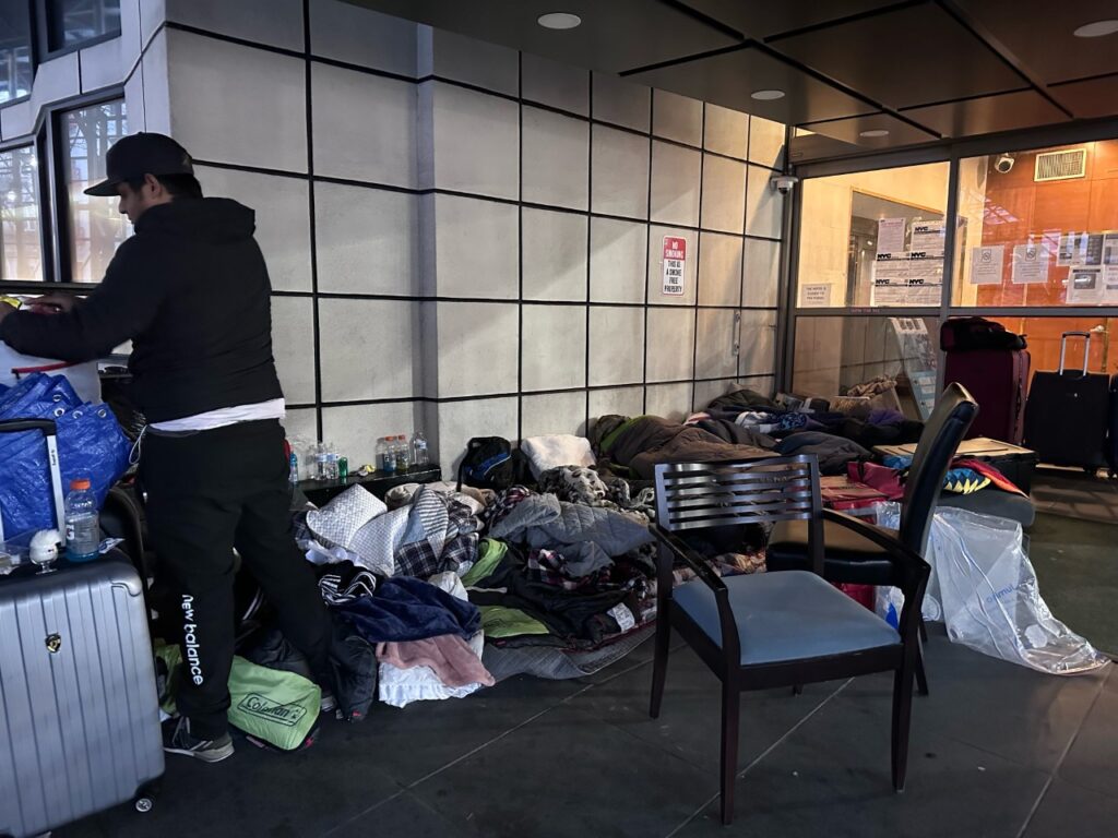 The human tide behind the open-air homeless encampment ready for another night