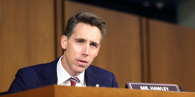 Sen. Josh Hawley, R-Mo., asks questions at a committee hearing on data security at Twitter.  