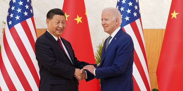 U.S. President Biden shakes hands with Chinese President Xi Jinping as they meet on the sidelines of the G-20 leaders' summit in Bali, Indonesia, Nov. 14, 2022.