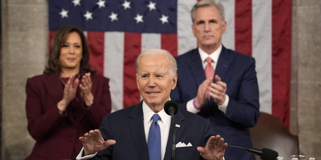 Biden speaks during a State of the Union address with US Vice President Kamala Harris, left, and US House Speaker Kevin McCarthy, a Republican from California, right.