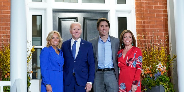 President Joe Biden and first lady Jill Biden pose for photos with Canadian Prime Minister Justin Trudeau and his wife Sophie Gregoire Trudeau at Rideau Cottage, Thursday, March 23, 2023, in Ottawa, Canada.