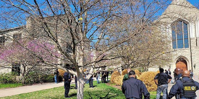 This photo provided by the Metro Nashville Police Department shows officers at an active shooter event that took place at The Covenant School in Nashville, Tennessee, on Monday, March 27, 2023.