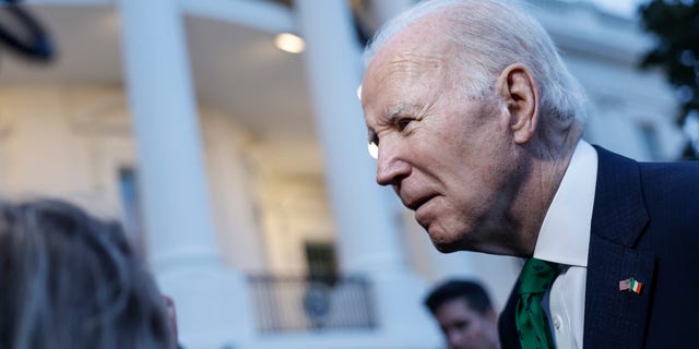 President Biden speaks with reporters before departing from the South Lawn of the White House on Marine One on March 17, 2023, in Washington, D.C. The president denied that members of his family received more than $1 million in payments from Hunter Biden's business associate, who was linked to a Chinese firm. 