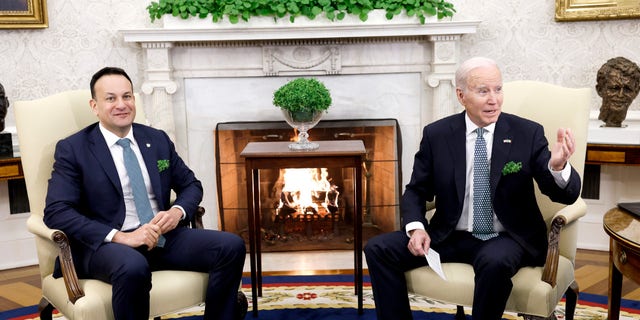 U.S. President Joe Biden and Irish Taoiseach Leo Varadkar speak to one another in the Oval Office of the White House on March 17, 2023, in Washington, DC. U.S. President Biden and Prime Minister Varadkar will take part in a series of St. Patrick’s Day Celebrations at the White House and the U.S. Capitol.