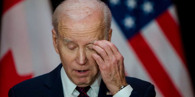 US President Joe Biden pauses during a joint press conference with Canada's Prime Minister Justin Trudeau at the Sir John A. Macdonald Building in Ottawa, Canada, on March 24, 2023. 