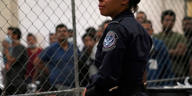 Border Patrol agent at station in McAllen, Texas.