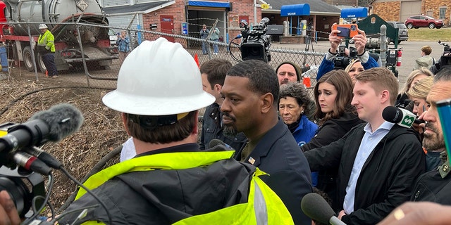 EPA administrator Michael Regan seen answering questions at Sulphur Creek in East Palestine, Ohio on Thursday, Feb. 16, 2023. He was back in East Palestine Tuesday.