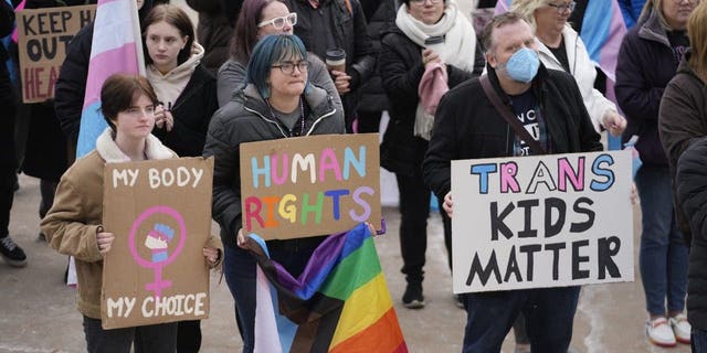 People gather in support of transgender youth during a rally at the Utah State Capitol Tuesday, Jan. 24, 2023, in Salt Lake City.