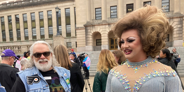 Drag performer Poly Tics (right) attends a rally in Frankfort, Kentucky.