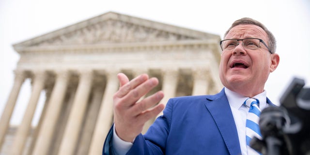 North Carolina House Speaker Tim Moore speaks in front of the Supreme Court in Washington, Dec. 7, 2022.