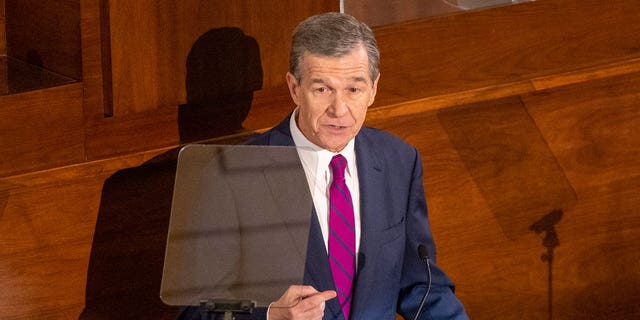 North Carolina Gov. Roy Cooper delivers his State of the State address to a joint session of the North Carolina General Assembly on March 6, 2023, in Raleigh, N.C.