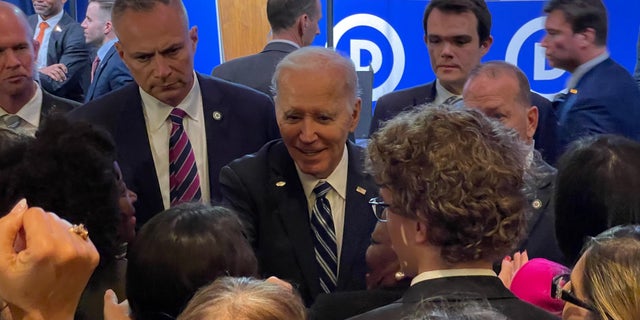 President Biden shakes hands with supporters after addressing the crowd at the Democratic National Committee's meeting in Philadelphia on Feb. 3, 2023.