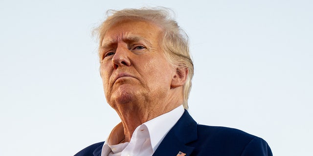 Former President Donald Trump looks on during a rally at the Waco Regional Airport on March 25, 2023, in Waco, Texas.