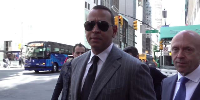 Alex Rodriguez seen walking near Trump Tower ahead of Trump's surrender in indictment case.