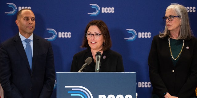 Incoming DCCC chair Rep. Suzan DelBene, D-Wash., flanked by incoming House Democratic leader Rep. Hakeem Jeffries, D-N.Y., and incoming House Democratic whip Rep. Katherine Clark, D-Mass., speaks during the news conference at the DCCC on Wednesday, December 21, 2022. (Bill Clark/CQ-Roll Call, Inc via Getty Images)