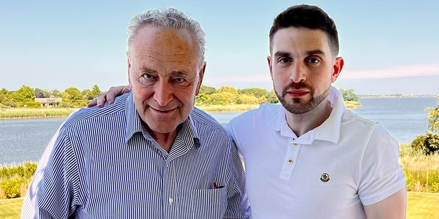 Senate Majority Leader Chuck Schumer of New York and Alex Soros, son of George Soros, take a picture together in an undisclosed location.
