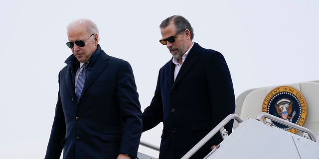 President Biden and his son, Hunter Biden, step off Air Force One at Hancock Field Air National Guard Base in Syracuse, N.Y., on Feb. 4, 2023.