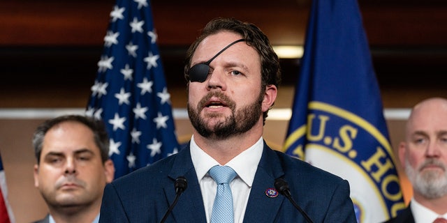 Rep. Dan Crenshaw, R-Texas, middle, led other Republicans alongside Sen. Tom Tillis, R-NC, in calling for a congressional rule change barring lawmakers from using TikTok for official communications.