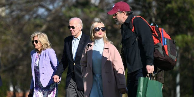 US President Joe Biden, First Lady Jill Biden, Hunter Biden, and his wife Melissa Cohen walk to the motorcade after arriving on Marine One at Fort McNair in Washington, D&gt;C., on April 9, 2023.