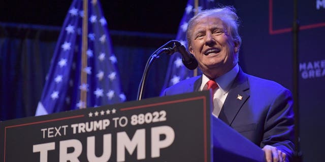 Former President Trump speaks at a campaign event March 13, 2023, in Davenport, Iowa. 