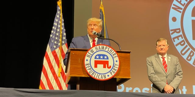 Former President Donald Trump gives the headline address at the New Hampshire GOP annual meeting, in Salem, New Hampshire, on Jan. 28, 2023. Trump is joined by outgoing NHGOP chair Steve Stepanek (right), who is joining Trump's campaign as a senior adviser in New Hampshire.
