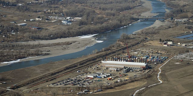 A judge has revoked an under-construction Montana gas plants air quality permit over climate concerns.