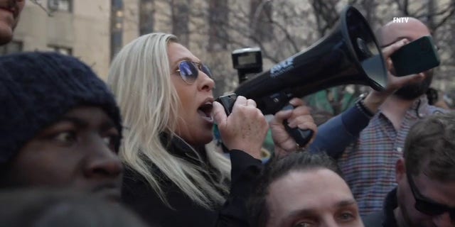 Marjorie Taylor Greene sends message to Eric Adams with bullhorn in hand ahead of Trumps arraignment.