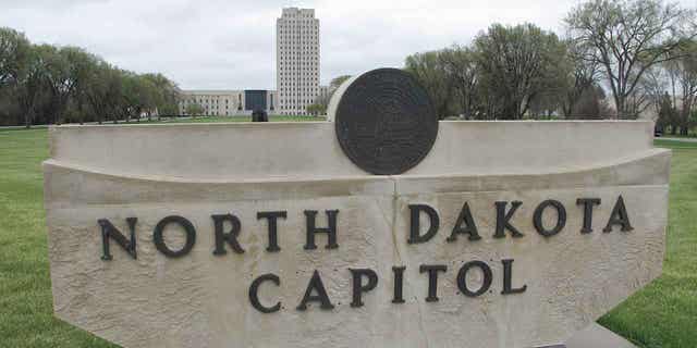 The North Dakota Capitol tower is pictured on April 19, 2012, in Bismarck, North Dakota. The state Senate passed a series of bills on April 3, 2023, that would restrict transgender peoples rights in sports, workplaces, health care, schools, and daily life.