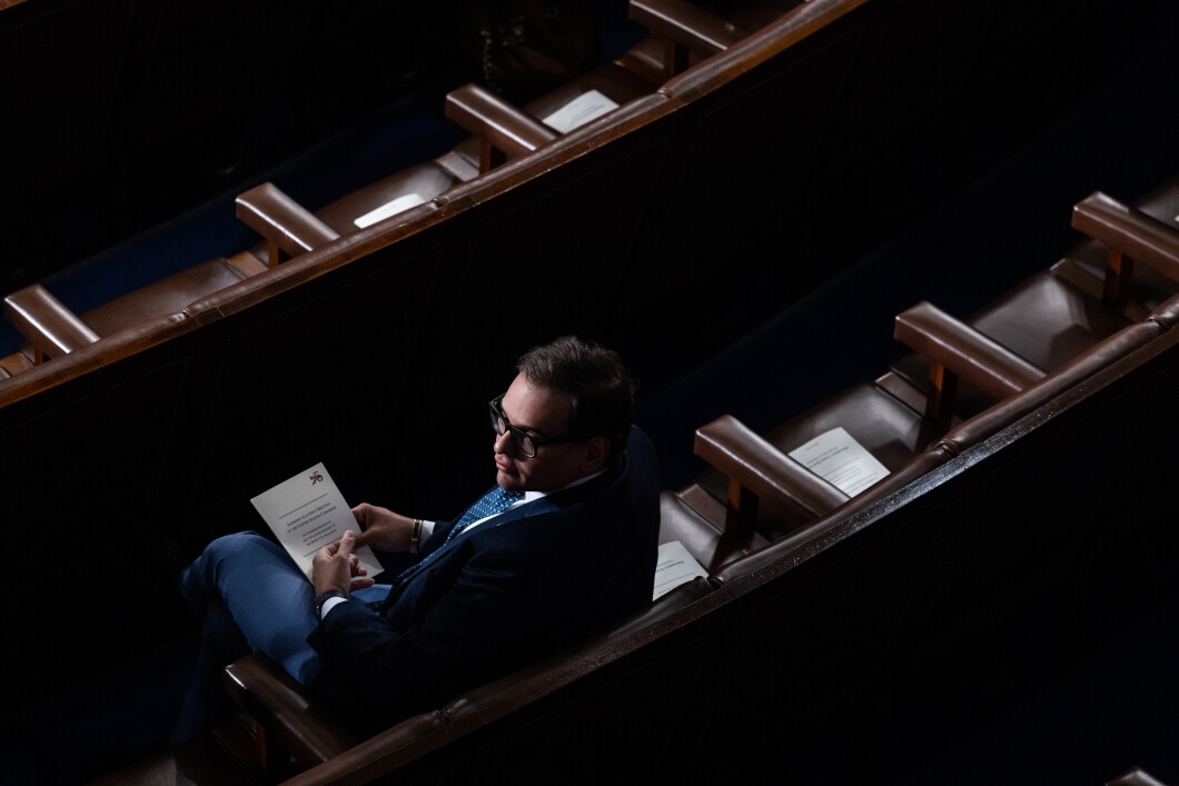 Scandal-plagued Rep. George Santos (R-NY) sits alone on the House Chamber floor at the beginning of a Joint Meeting of Congress with South Korean President Yoon Suk Yeol in Washington, DC, Thursday, April 27, 2023.