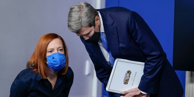 White House Press Secretary Jen Psaki confers with Special Presidential Envoy for Climate John Kerry