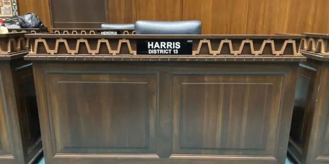 The desk used by Arizona Republican Rep. Liz Harris at the state Capitol in Phoenix stands empty moments after she was expelled from the Legislature on Wednesday, April 12, 2023. The Arizona House of Representatives expelled a Harris in a bipartisan vote after she organized a presentation accusing a wide range of politicians, judges and public officials of both parties of taking bribes from a Mexican drug cartel. 