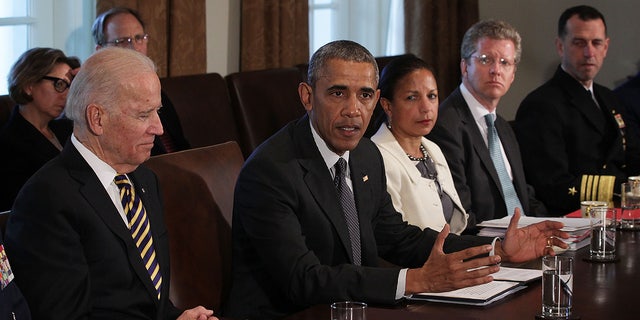 Susan Rice at table with Obama