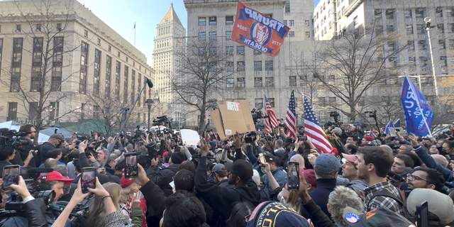 Protesters outside the courthouse where President Trump was arraigned on April 4.