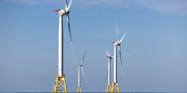 AT SEA - JULY 07: Wind turbines generate electricity at the Block Island Wind Farm on July 07, 2022 near Block Island, Rhode Island. The first commercial offshore wind farm in the United States is located 3.8 miles from Block Island, Rhode Island in the Atlantic Ocean. The five-turbine, 30 MW project was developed by Deepwater Wind and began operations in December, 2016 at a cost of nearly $300 million. (Photo by John Moore/Getty Images)