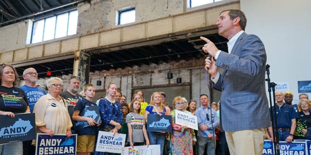 Democratic Kentucky Gov. Andy Beshear speaking to a crowd