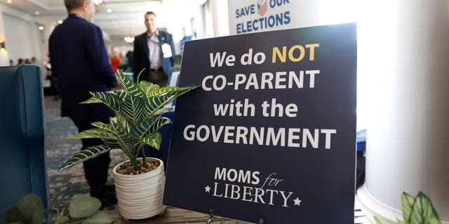 A sign for the Moms for Liberty