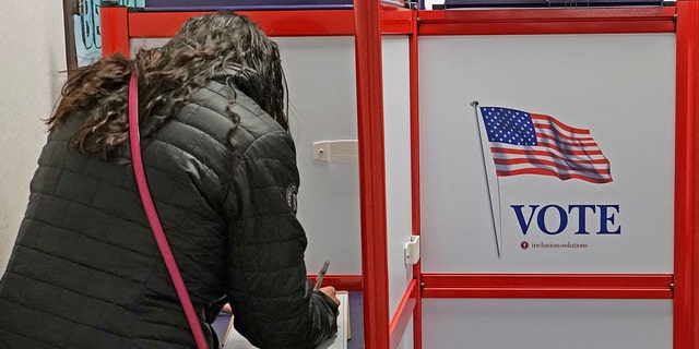 Woman voting Utah