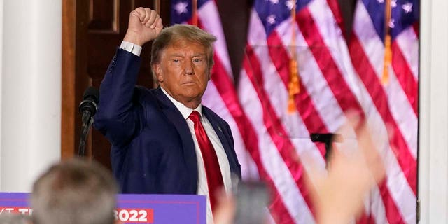 Former President Donald Trump gestures after speaking at Trump National Golf Club in Bedminster