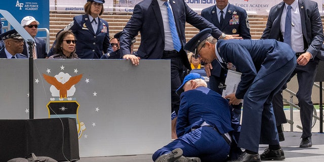 Biden falls at Air Force graduation