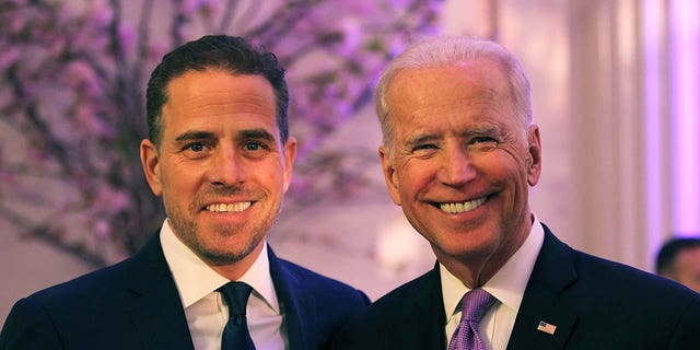 President Biden smiling with Hunter Biden