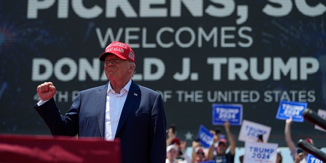 Trump on stage at a rally