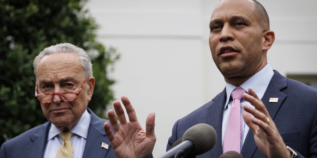 Democratic congressional leaders Hakeem Jeffries and Chuck Schumer speak to the media