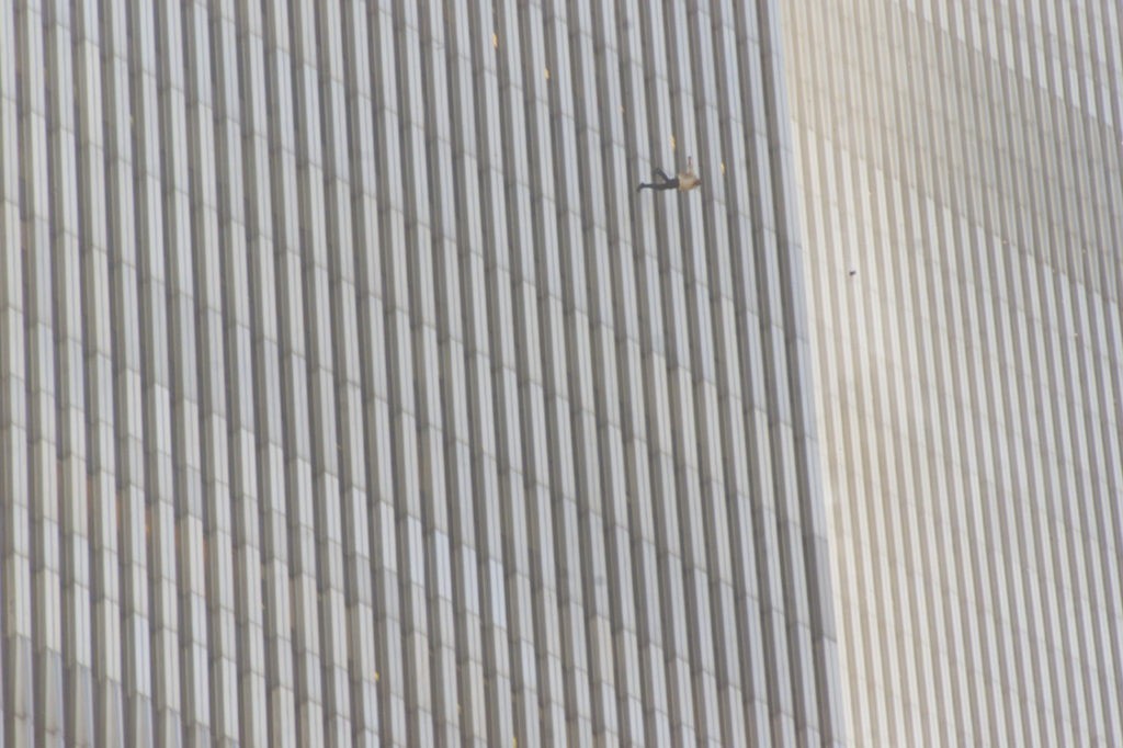 A man jumps from the north tower of New York's World Trade Center Tuesday, Sept. 11, 2001 after terrorists crashed two hijacked airliners into the World Trade Center. (AP Photo/Richard Drew)