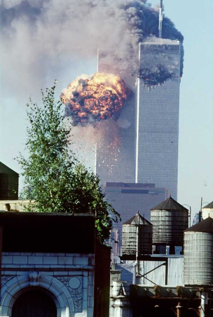 A fireball erupts from one of the World Trade Center towers as it is struck by the second of two airplanes in New York, Tuesday, Sept. 11, 2001. In a horrific sequence of destruction, terrorists hijacked two airliners and crashed them into the World Trade Center in a coordinated series of attacks that brought down the twin 110-story towers. (AP Photo/Todd Hollis)