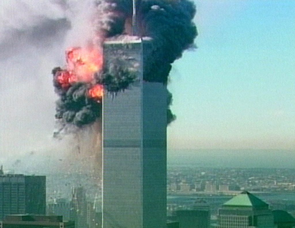 A ball of fire explodes from one of the towers at the World Trade Center in New York after a plane crashed into it in this image made from television Tuesday Sept. 11, 2001. The aircraft was the second to fly into the tower Tuesday morning. (AP Photo/ABC via APTN) TV OUT CBC OUT