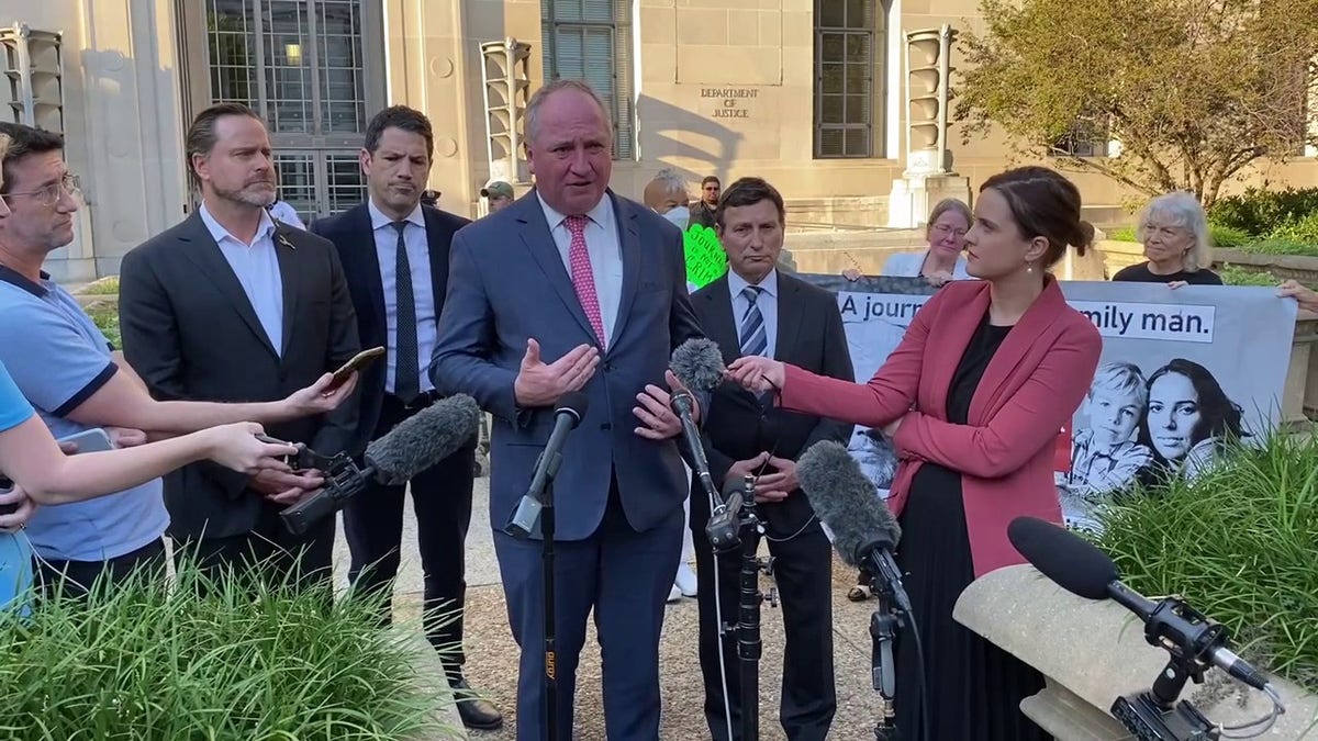 Australian delegation speaks at a press conference