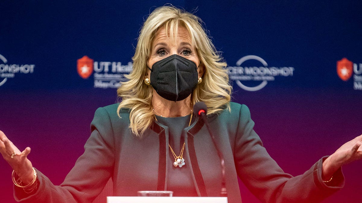 Jill Biden speaks while wearing a face mask