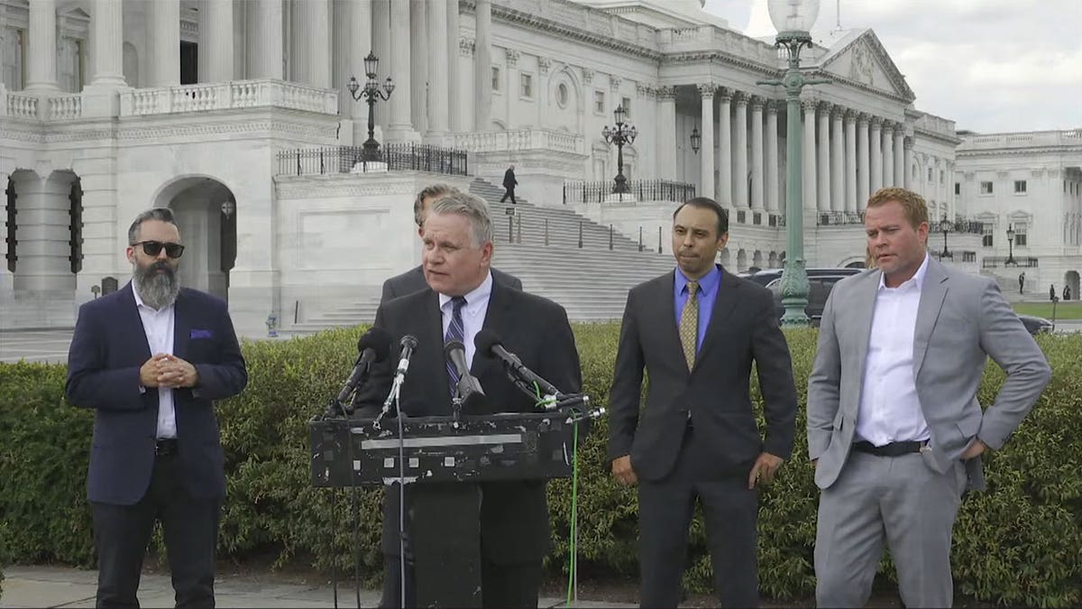 Chris Smith in front of Capitol