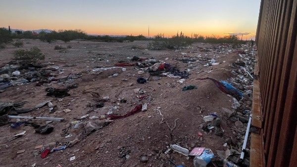 Acres of garbage found littered along the Arizona border wall near Lukeville, Arizona. (Randy Clark/Breitbart Texas)