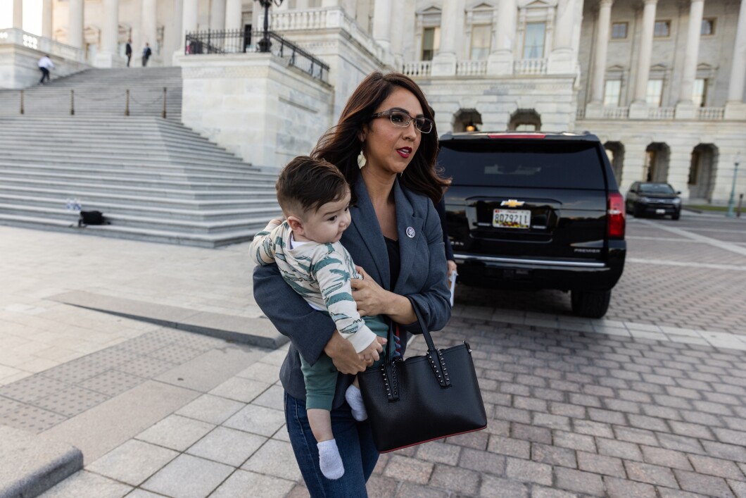 Rep. Lauren Boebert (R-CO) walks outside the U.S. Capitol holding her grandson following the motion to vacate Speaker Kevin McCarthy, on Tuesday, Oct. 3, 2023. This week Boebert said she is "willing to ditch" the House's motion to vacate rule, in order to support Rep. Jim Jordan's (R-OH) bid for speaker.